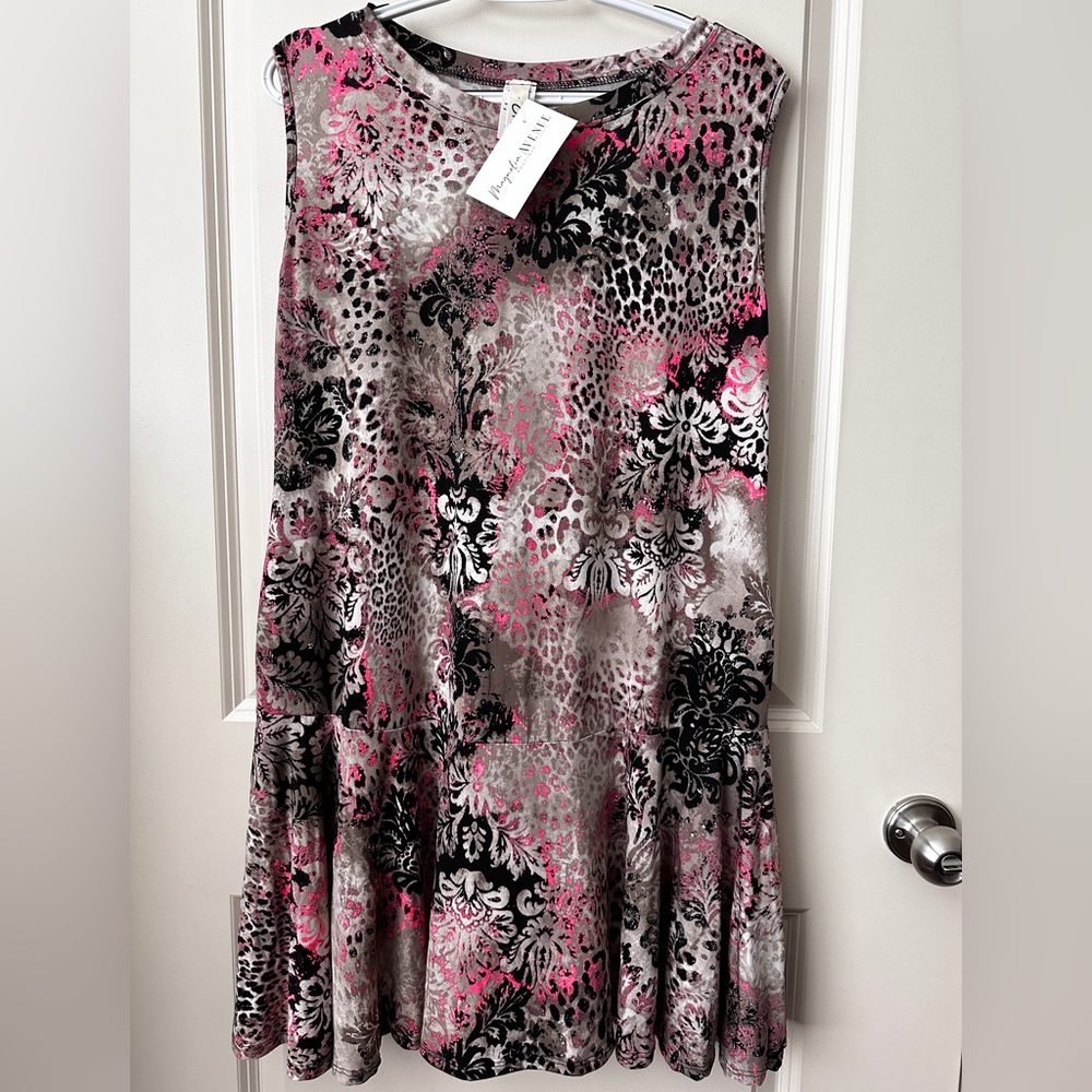 NWT sleeveless animal print dress with pockets